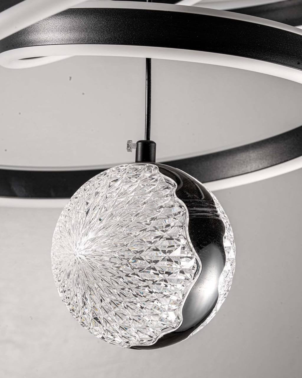 Black Rings Crystal Pendant – in a room