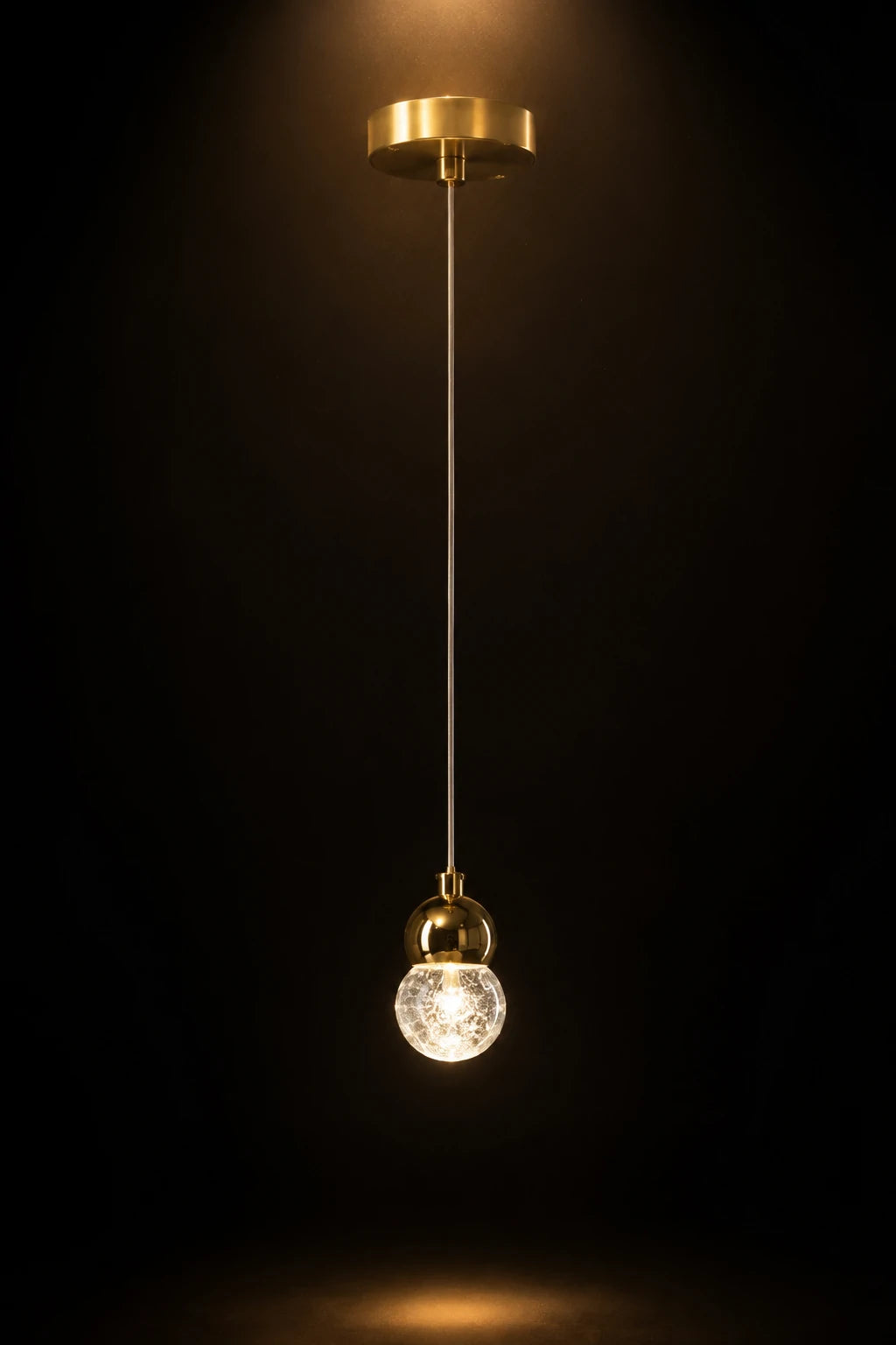 Golden Globe Bedside Lamp – on a nightstand